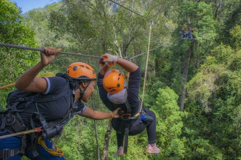 Woman on zipline in South Africa