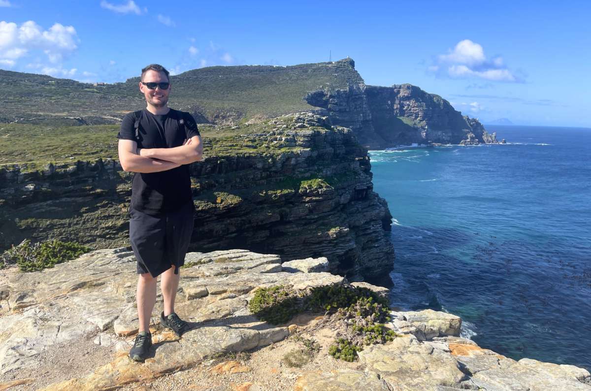 Cliffside view at Cape of Good Hope in Table Mountain National Park, South Africa, overlooking rugged coastline and ocean, photo by Next Level of Travel