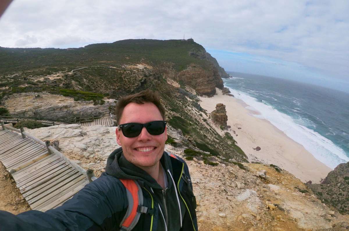 Cliffside view at Cape of Good Hope in Table Mountain National Park, South Africa, with rugged coastline and ocean below, photo by Next Level of Travel 