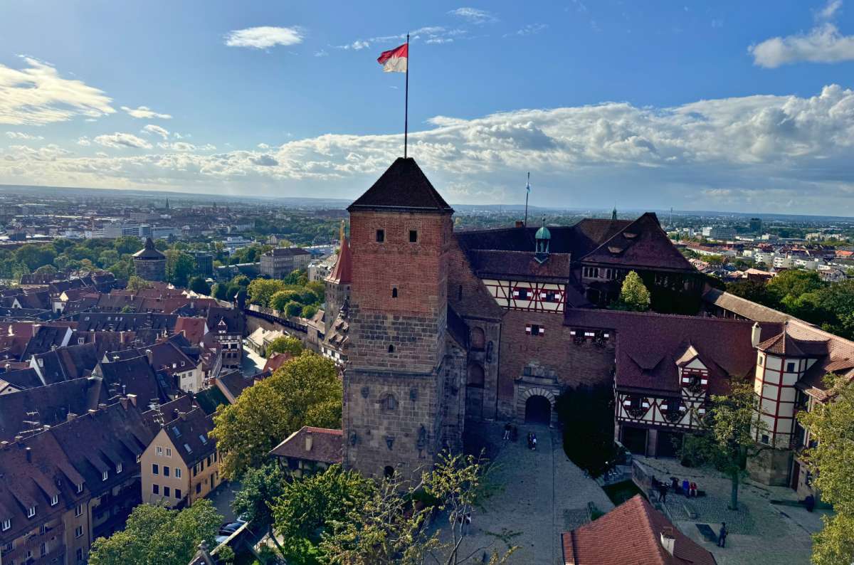 A panoramic view of Nuremberg’s Imperial Castle complex with its medieval towers, Germany, photo by Next Level of Travel