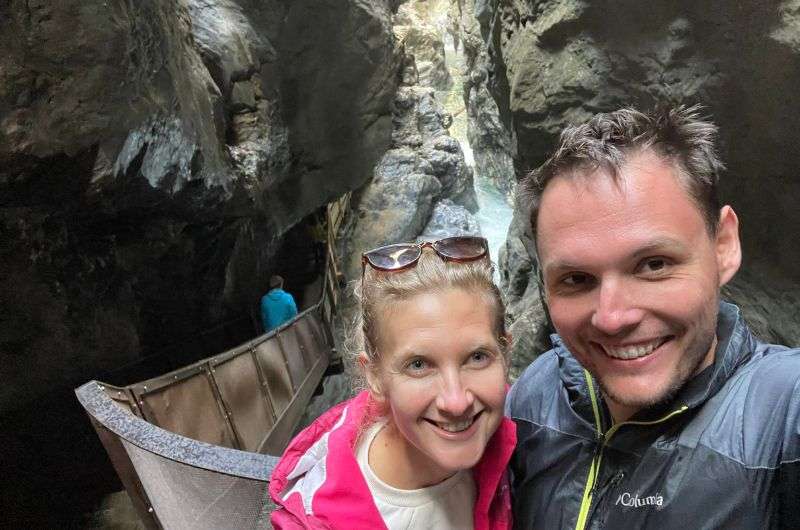 couple visiting tourist attraction in Austria, Liechtenstein Klamm, Austria, photo by Next level of travel
