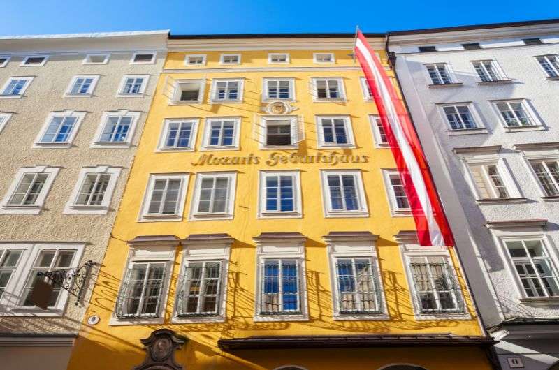 Mozart’s Birthplace, a bright yellow building on Getreidegasse in Salzburg, Austria