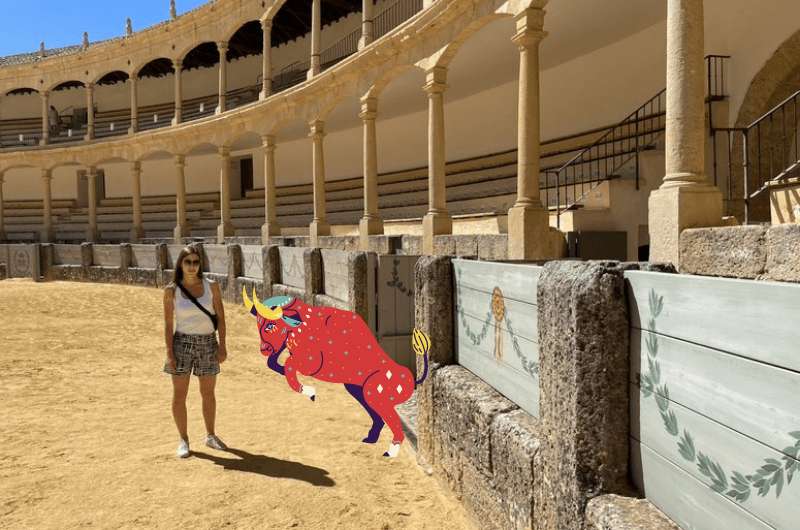 A tourist in Plaza de Toros, Ronda, Spain