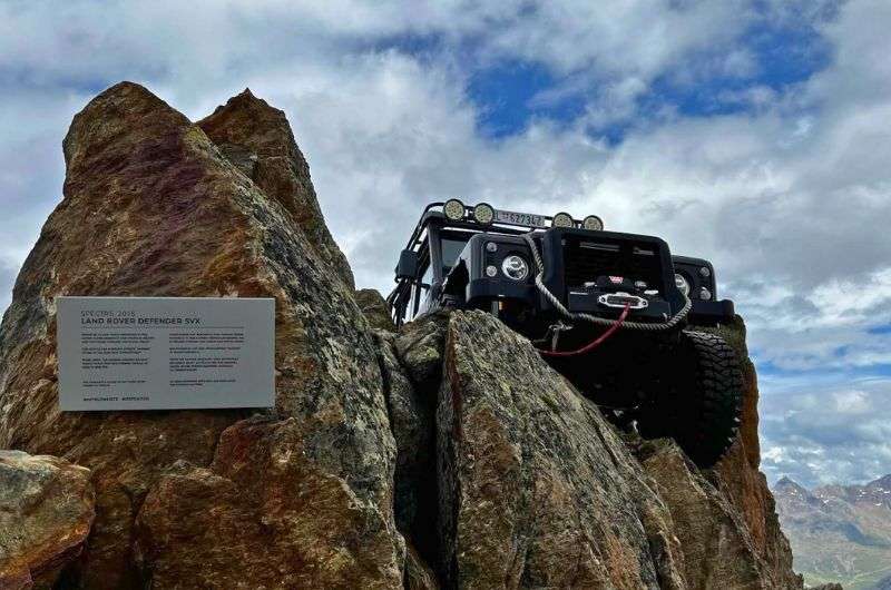 a rugged Land Rover Defender from Spectre perched on rocks outside, Museum of James Bond—007 Elements, Sölden, Austria