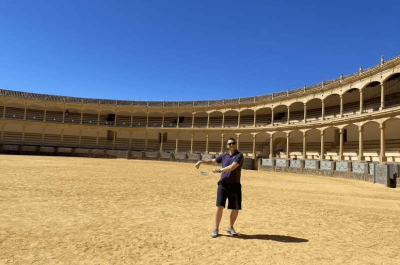 A tourist in Ronda's bullfighting arena, Spain