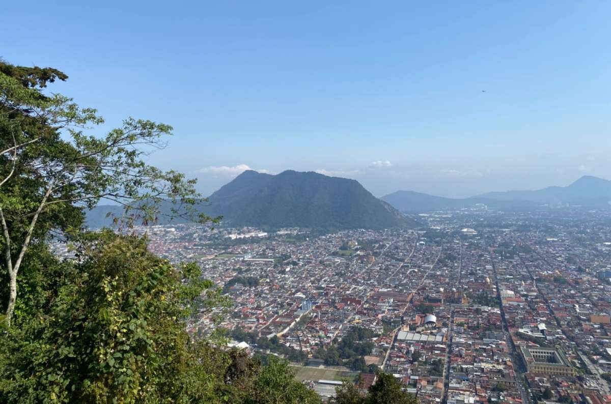 a photo ofa town shot from the viewpoint Orizaba up above, Mexico, photo by Next Level of Travel