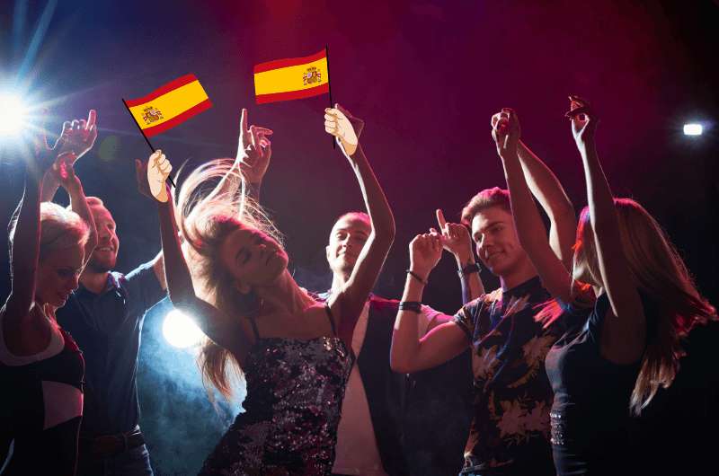 Party people dancing in Spain