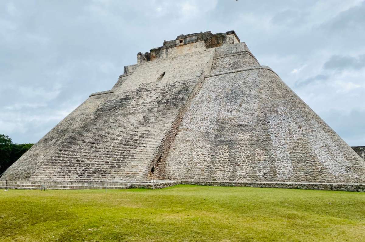 Pyramid of the Magician at Uxmal on a cloudy day, Yucatán, Mexico, photo by Next Level of Travel