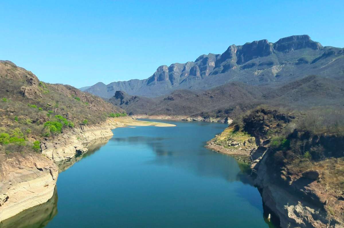 River winding through rugged cliffs in Copper Canyon, Chihuahua, Mexico, photo by Next Level of Travel