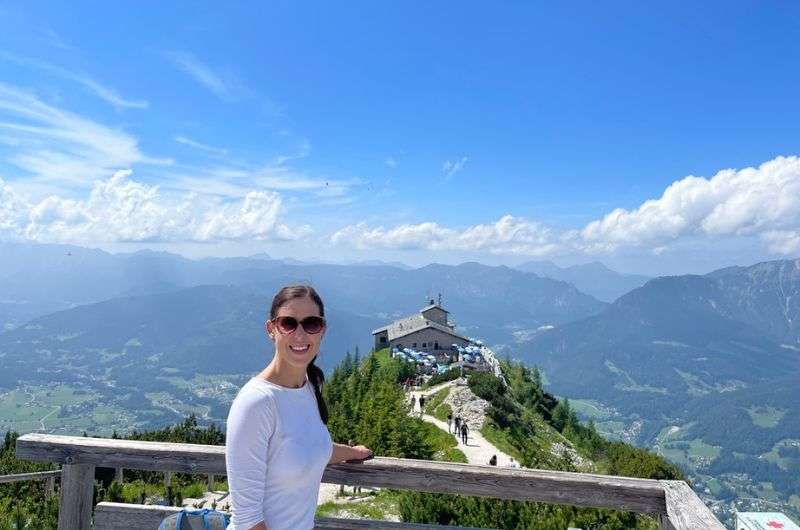 Standing at a viewpoint over the Eagle’s Nest with the mountains in the background