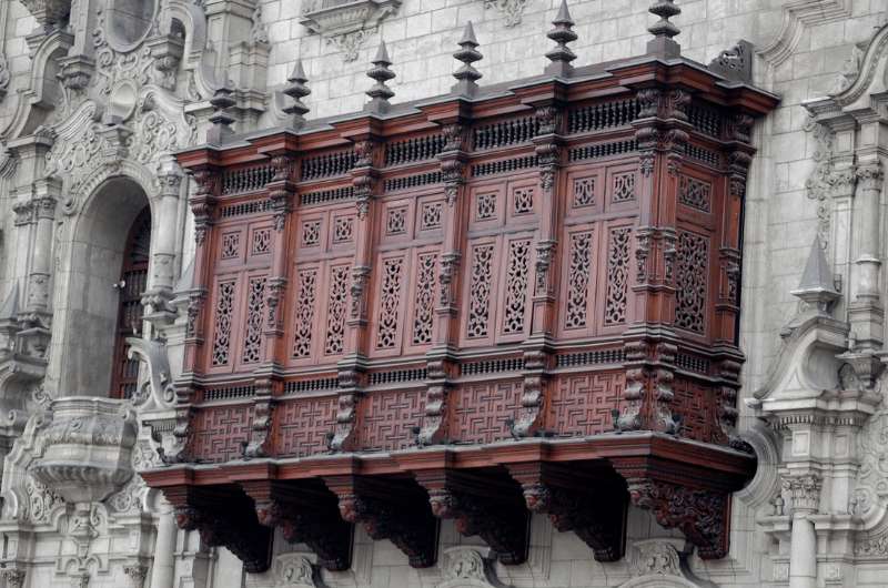 The box balconies of the buildings on Plaza de Armas in Lima 
