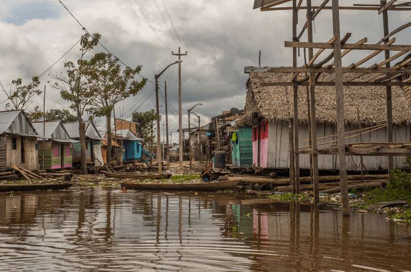 Huts on the river in Iquitos Peru