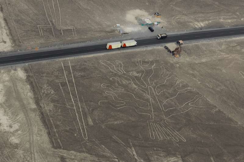 Road cutting through the Nazca Lines in Peru