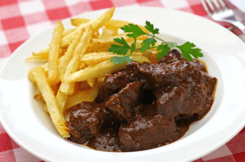 A plate of Flemish beef stew, traditional food of Belgium