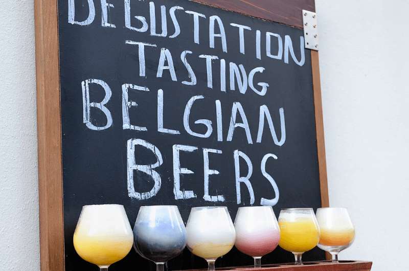 A sign advertising a Belgian beer degustation