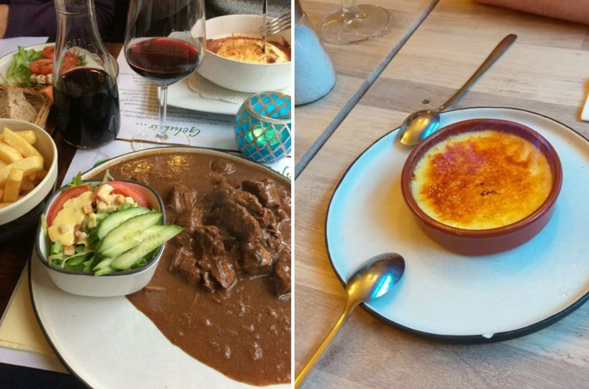 Flemish beef stew with fries, salad, and red wine, followed by crème brûlée for dessert at De Gastro restaurant in Bruges, Belgium