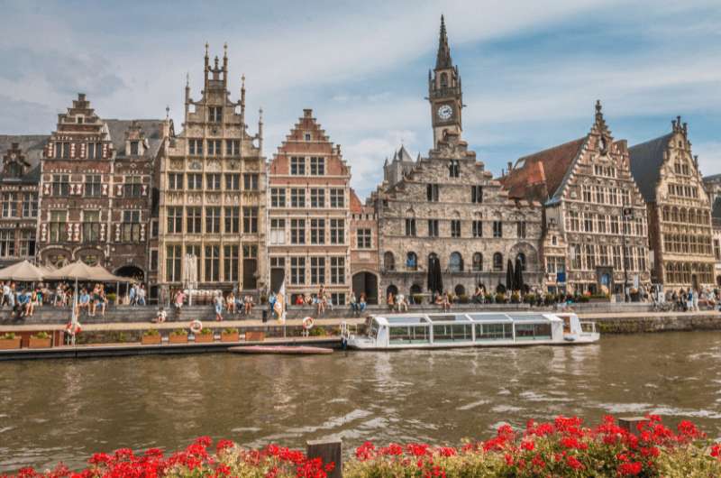 Graslei district in Ghent, historical buildings by the river in Ghent