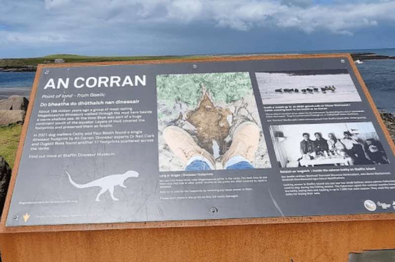 The sign about dinosaur footprints at An Corran Beach on Isle of Skye