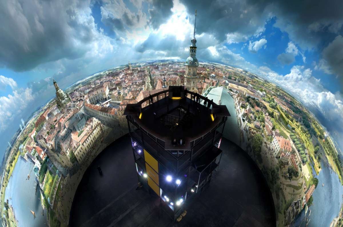 A panoramic image inside the Panometer Dresden, showing a 360-degree visualization of historical Dresden from a high central viewing platform, Germany