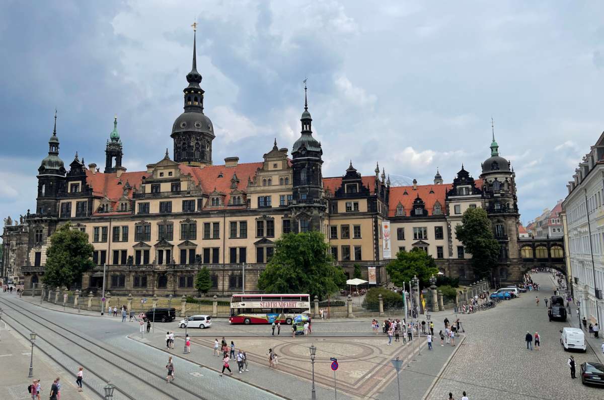 a photo of the Dresden city center with old buildings and people walking around, Germany, photo by Next Level of Travel