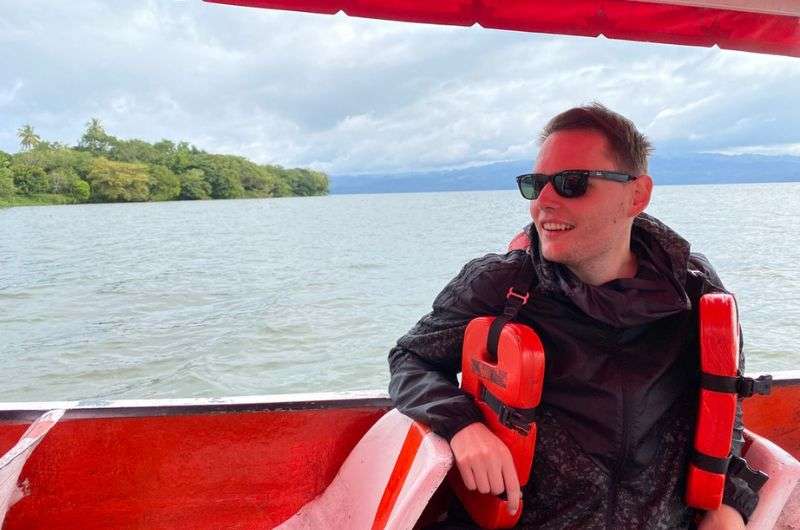 A tourist on a boat trip in Laguna Catemaco in Veracruz, Mexico