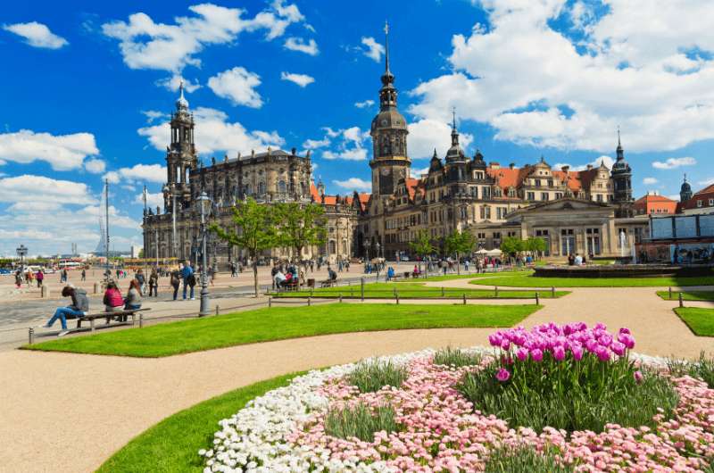 Dresden Royal Palace form the outside with flowers in the forefront 