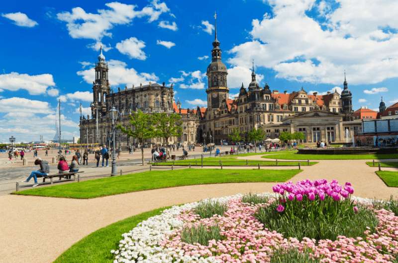 Dresden Royal Palace form the outside with flowers in the forefront 