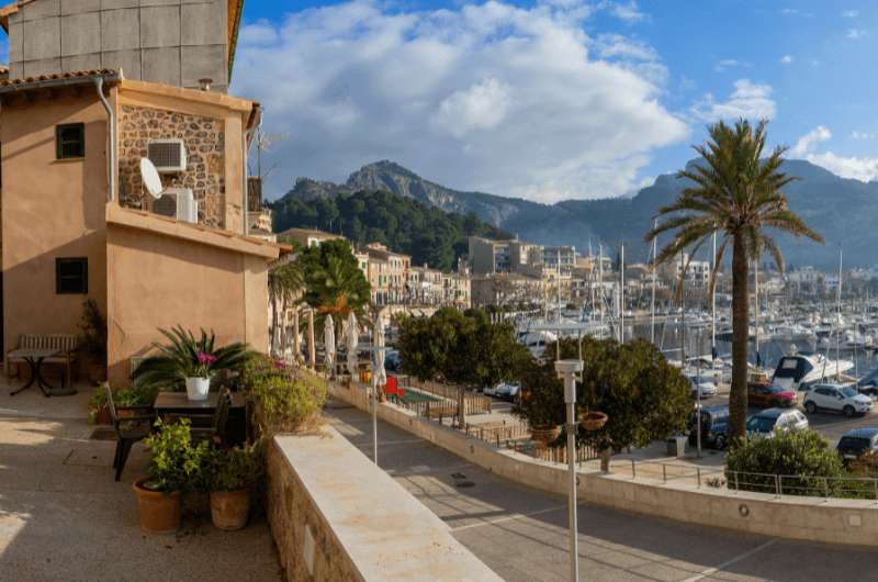 View of Port de Soller with mountains in the background