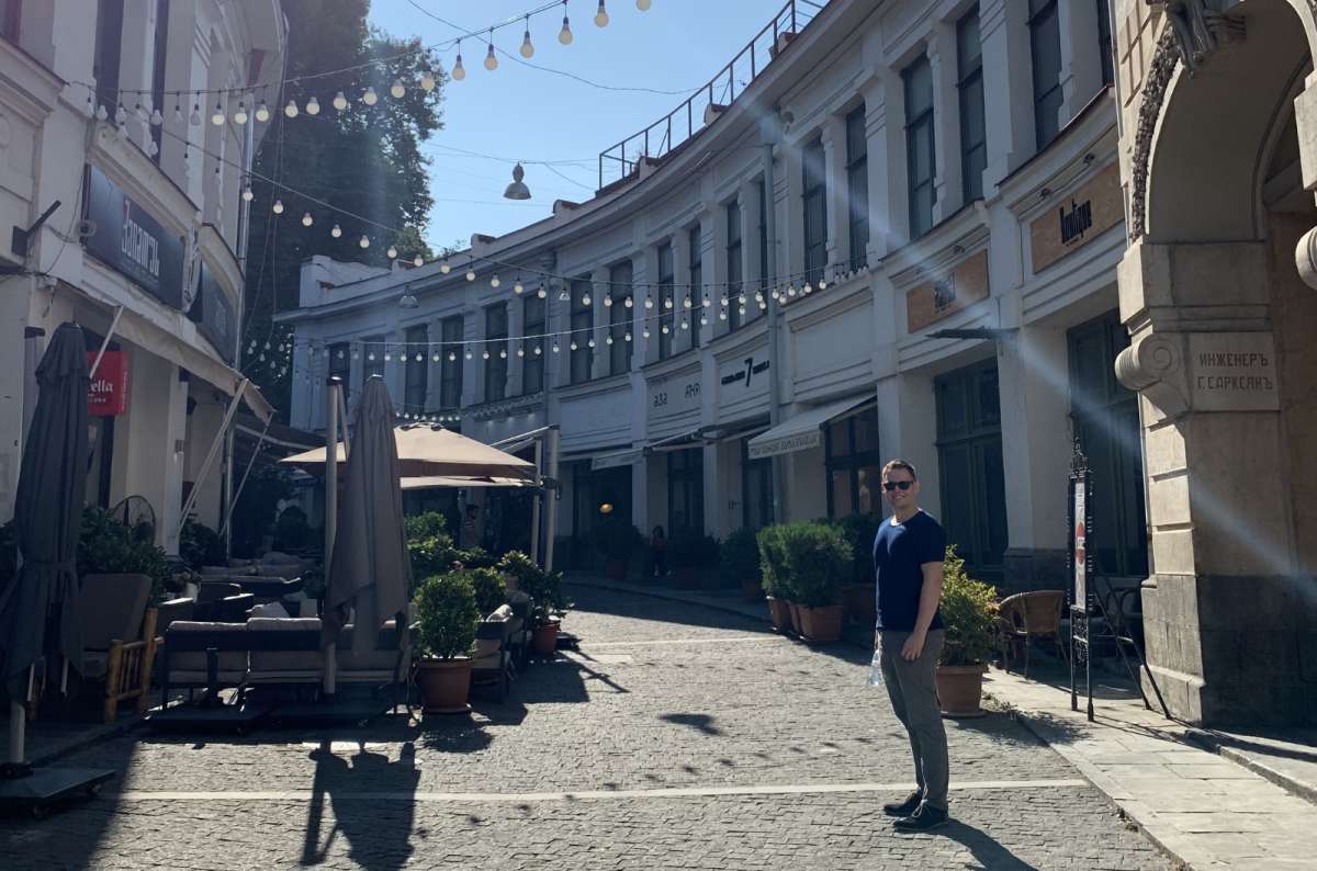 Curved pedestrian street with cafés and historic buildings in Old Town Tbilisi, Tbilisi, Georgia, photo by Next Level of Travel