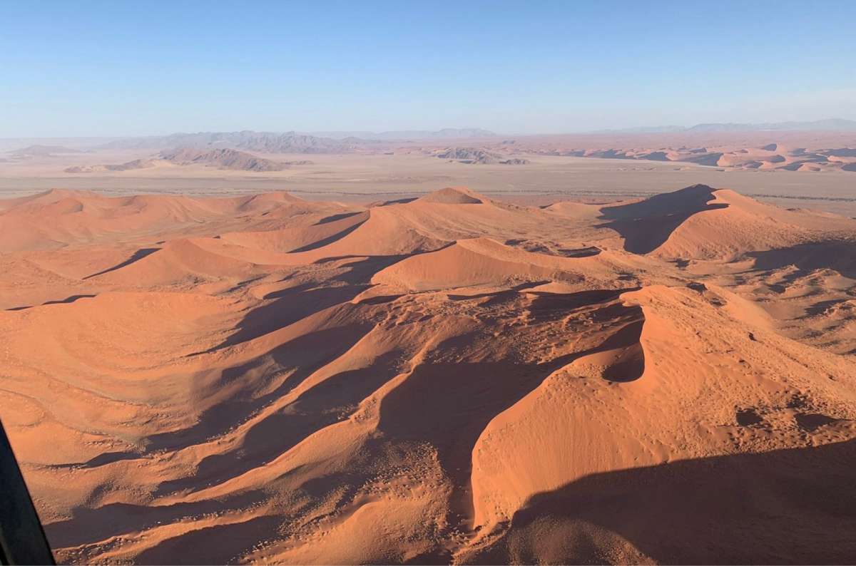a photo of the Namib desert dunes from up above, Namibia