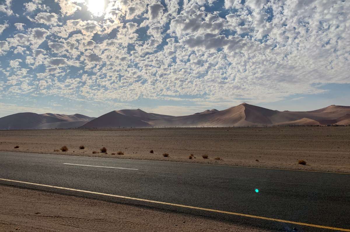 a photo of the sand dunes in Sossusvlei in Namib Naukluft National Park, Namibia, photo by Next Level of Travel