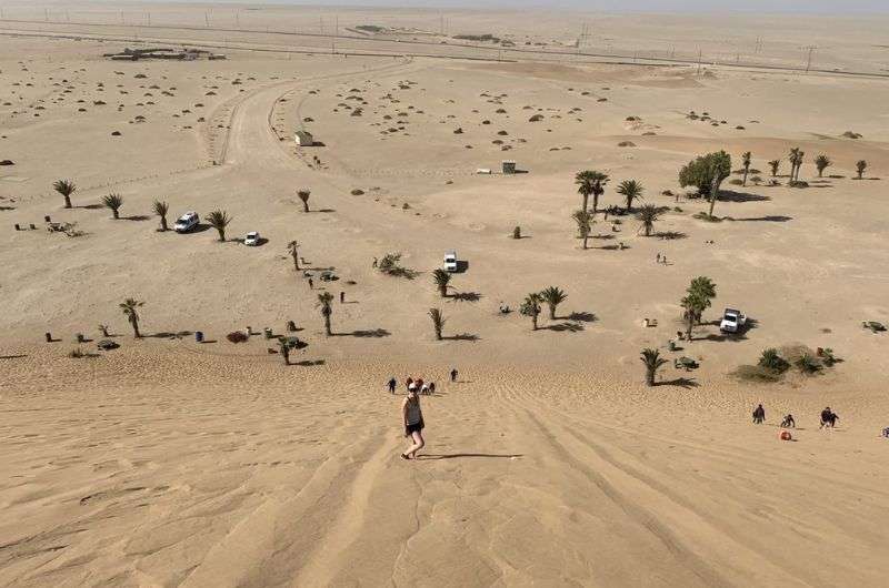 A view from the top of Dune 7 down towards the parking and service area