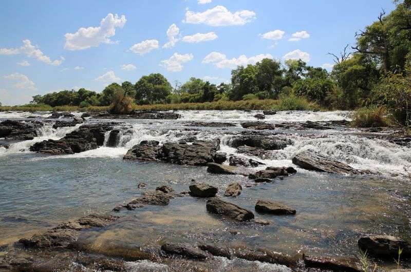 Alt text: Popa Falls in Caprivi Strip, Namibia