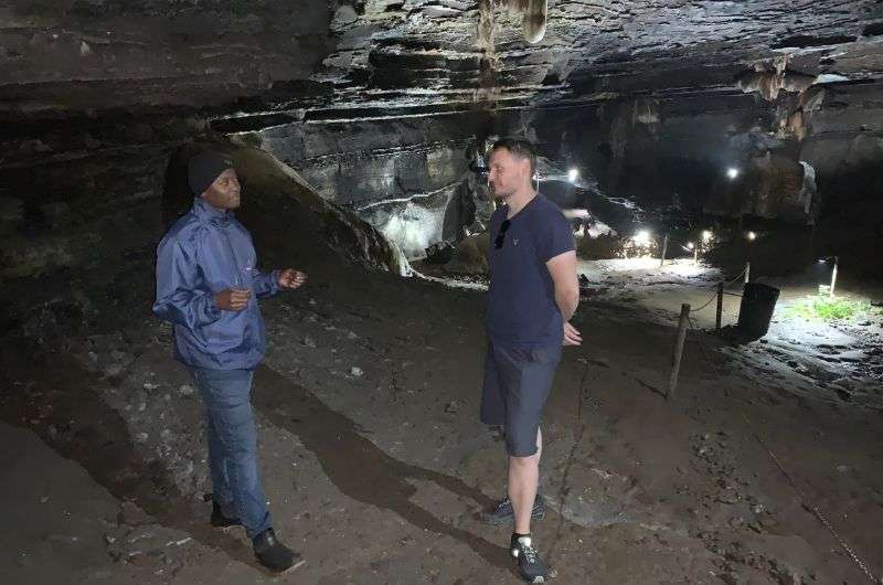 Chatting with a guide in Sudwala Caves, South Africa