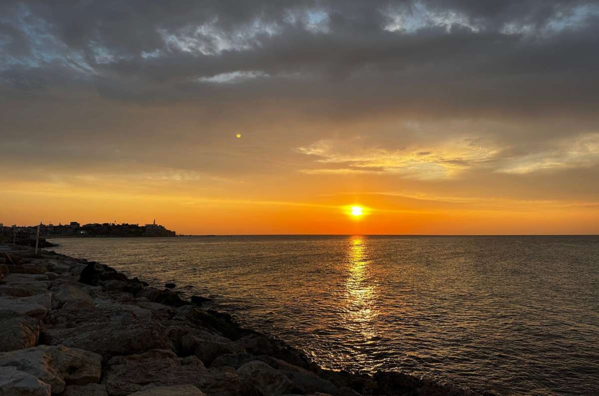  a photo of a sunset at one of the best beaches in Israel–Gordon Beach, Tel Aviv, Israel, photo by Next Level of Travel