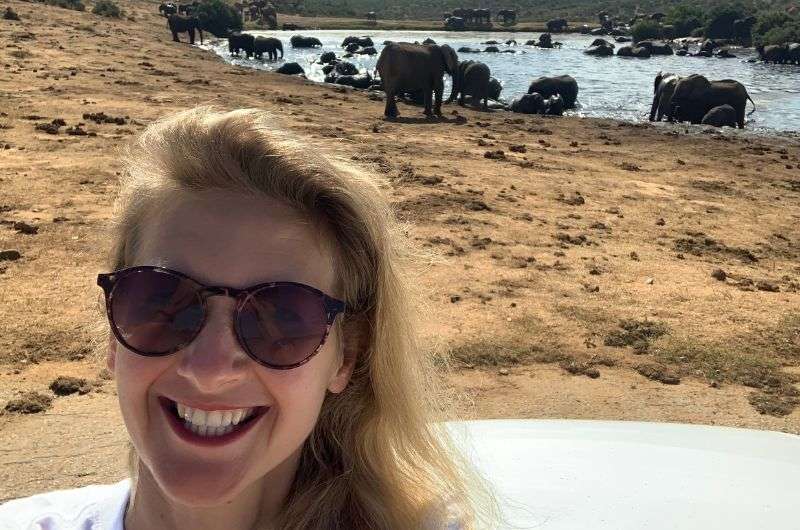 A tourist visiting the Addo Elephant Park on Garden Route in South Africa