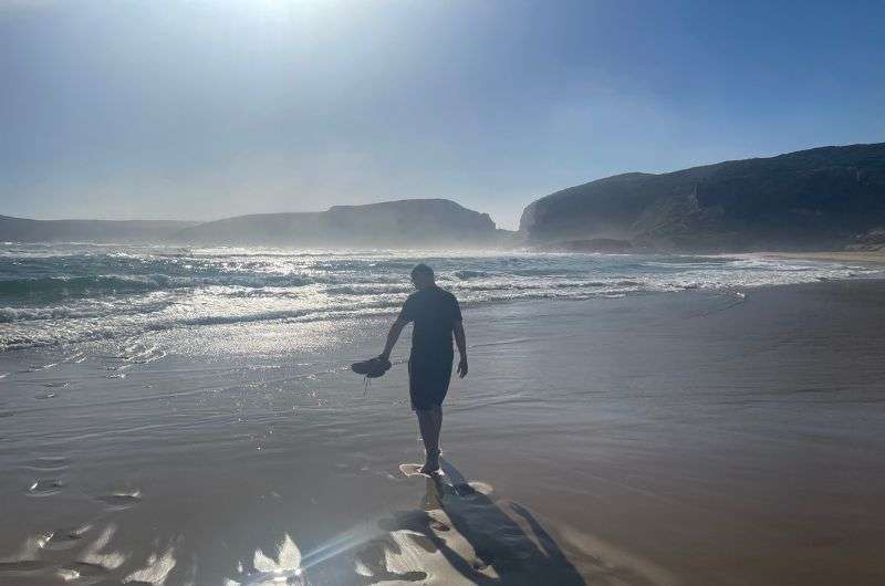 Walking on the beach in Robberg Nature Reserve, Garden Route in Southa Africa