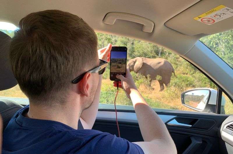 Taking pictures of an elephant in Addo Elephant Park, South Africa