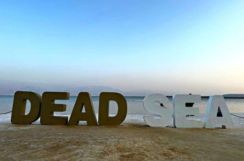 The Dead Sea sign on the beach, Israel