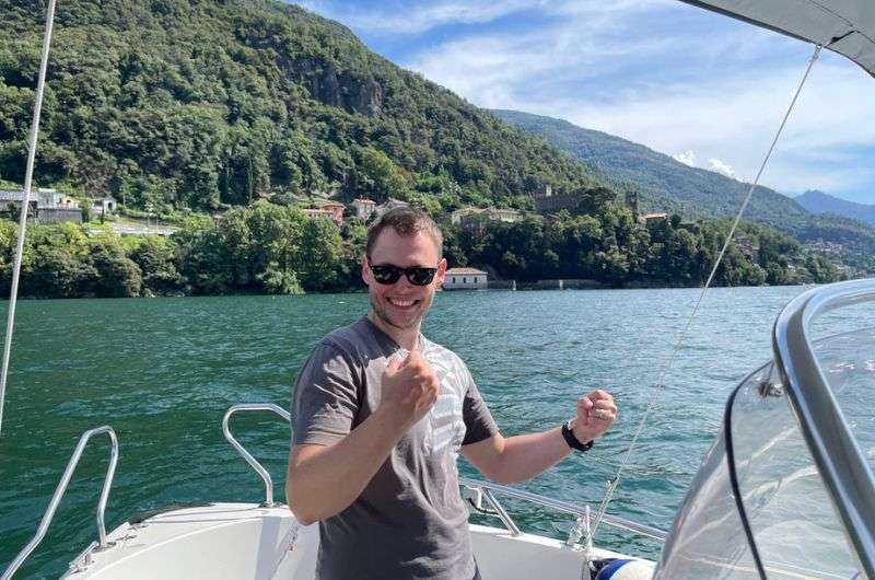 A tourist on a boat in Italy