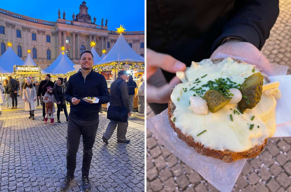 Tourist at Berlin Christmas market holding melted cheese bread topped with pickles and onions, photo by Next Level of Travel