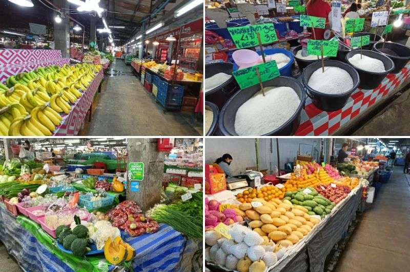 Buying food at local market, Thailand