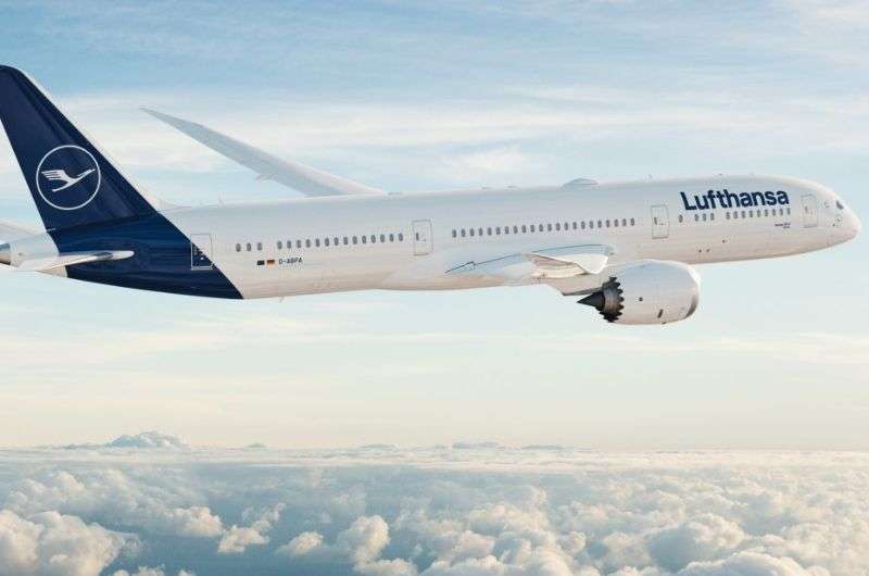 Lufthansa Boeing 787 flying above the clouds in good weather