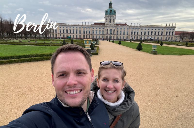 couple taking a selfie photo in front of Charlottenburg Castle, Berlin, Germany, photo by Next level of travel