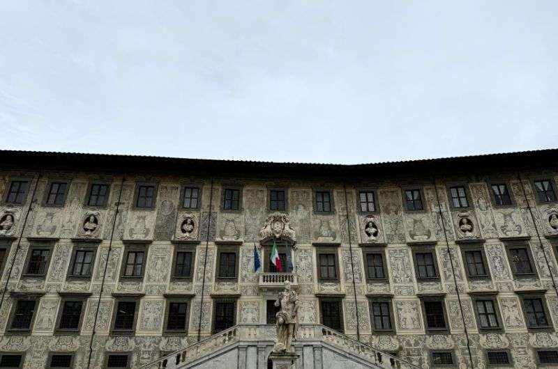 front view of the Palazzo della Carovana in Piazza dei Cavalieri, Pisa, Italy, photo by Next level of travel