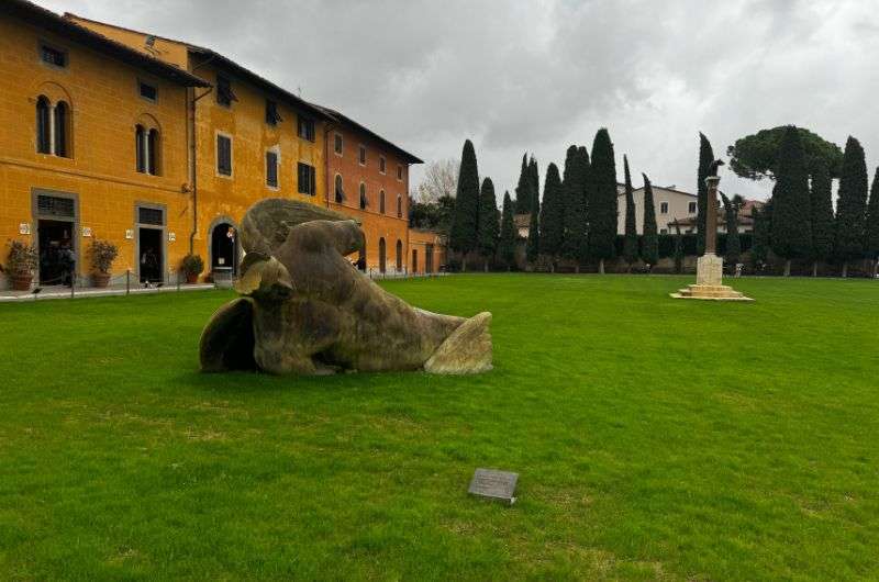 sculpture of the Fallen Angel, Pisa, Italy, photo by Next level of travel