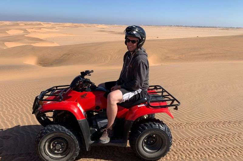 traveler on quad bike in Swakopmund Namib Dessert, Namibia, photo by Next level of travel