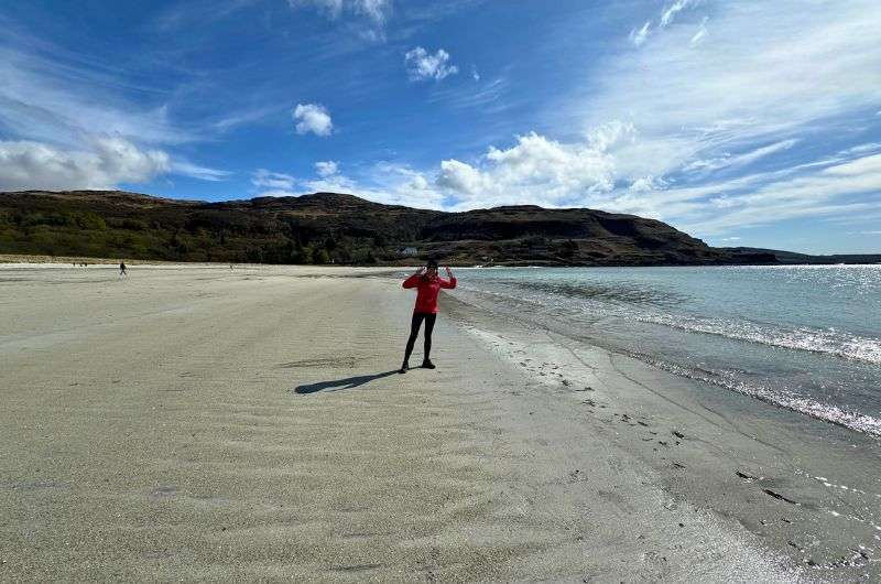 traveler on the beach, Isle of Mull Calgary, Scotland, photo by Next level of travel