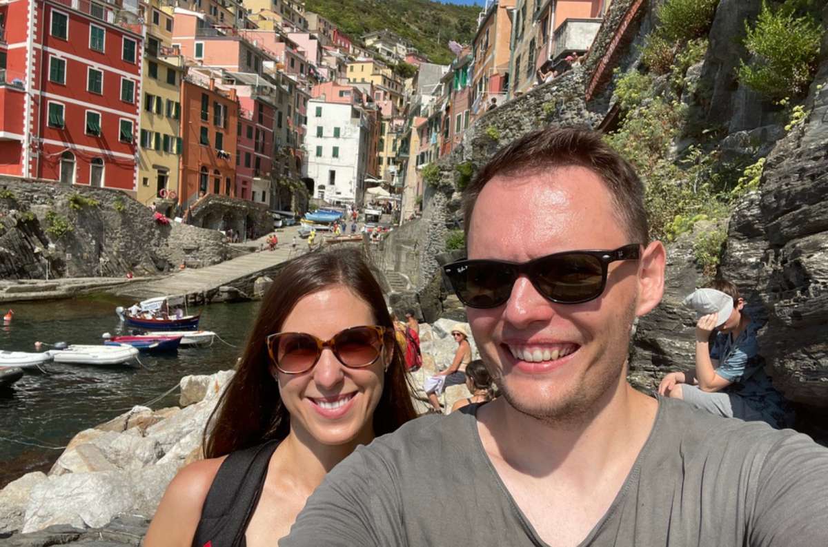 A couple of tourists taking a selfie in Riomaggiore, Cinque Terre, Italy, photo by Next Level of Travel