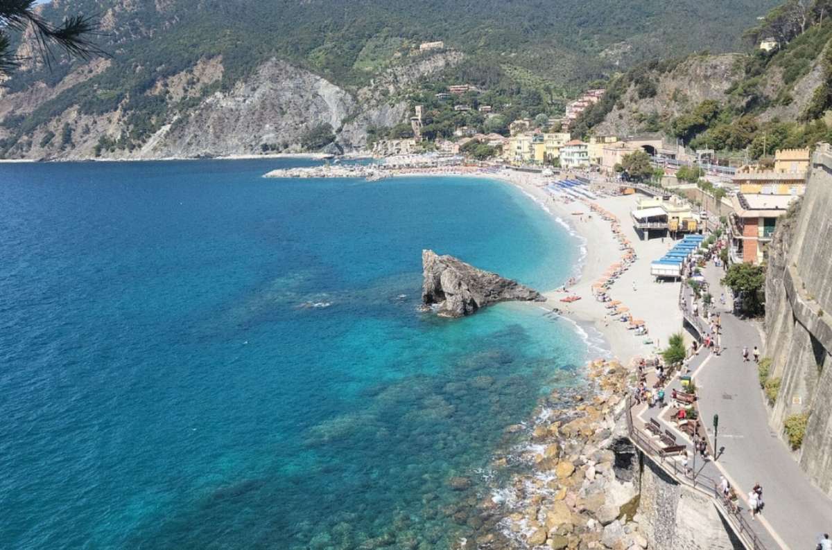 A narrow road lining the coast in Cinque Terre, Italy